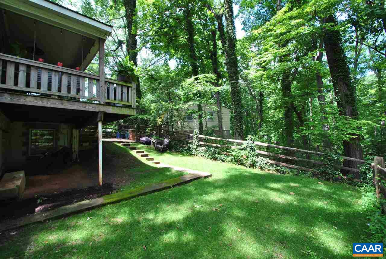 114 Elkhorn Road Charlottesville, VA 22903 - Photo 6 of 23 a view of an house with backyard porch and sitting area