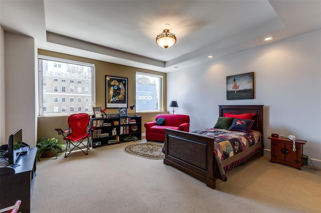 1505 Elm Street, Unit 1401 Dallas, TX 75201 - Photo 17 of 35 a bedroom with bed and a large window