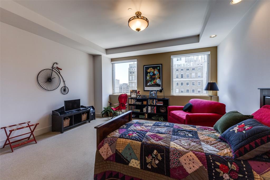 1505 Elm Street, Unit 1401 Dallas, TX 75201 - Photo 18 of 35 a bedroom with bed and a window