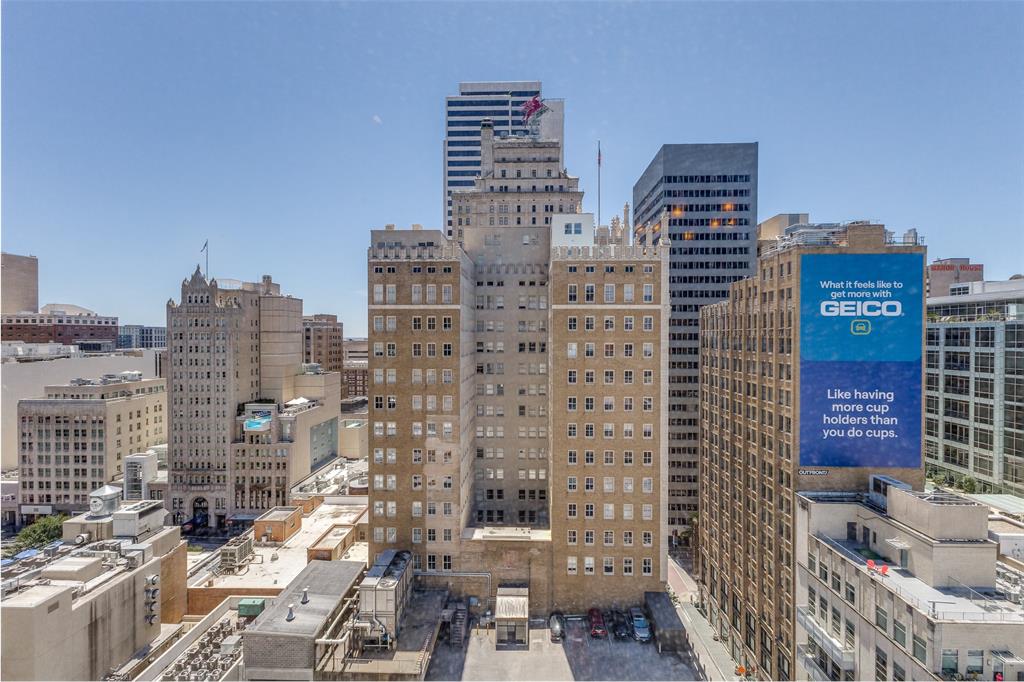 1505 Elm Street, Unit 1401 Dallas, TX 75201 - Photo 23 of 35 a city view with tall buildings