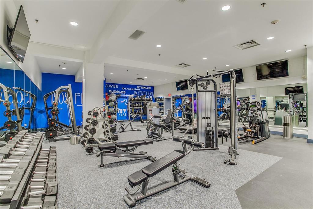 1505 Elm Street, Unit 1401 Dallas, TX 75201 - Photo 28 of 35 a view of a room with gym equipment