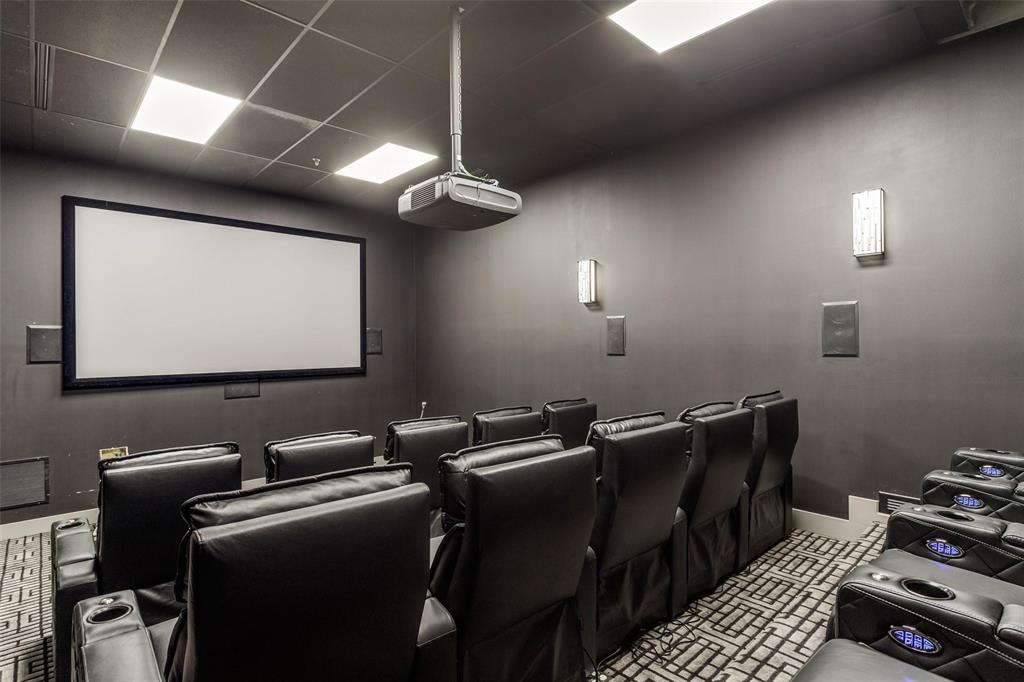 1505 Elm Street, Unit 1401 Dallas, TX 75201 - Photo 33 of 35 a room with furniture projector and screen
