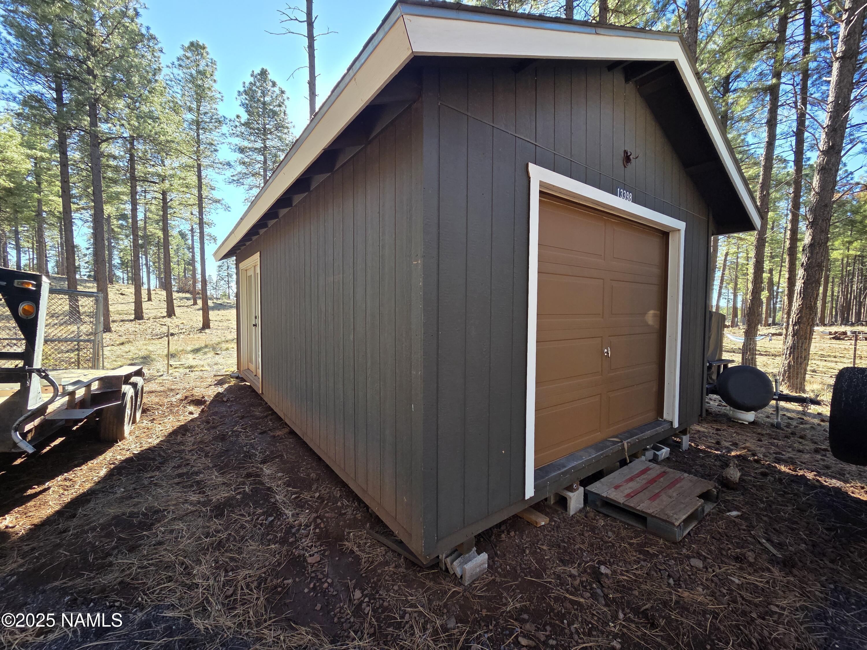 13398 Fallow Deer Road Parks, AZ 86018 - Photo 12 of 32 Garage With Storage