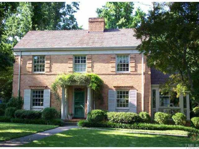 2627 Dover Road Raleigh, NC 27608 - Photo 1 of 1 a front view of a house with garden and trees