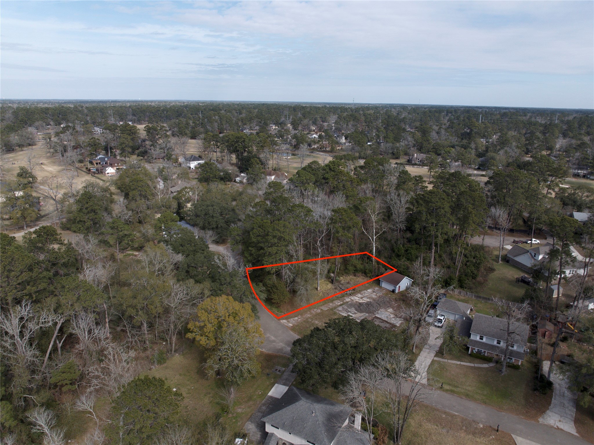 20 Brandon Road Conroe, TX 77302 - Photo 12 of 17 an aerial view of a city with lots of residential buildings