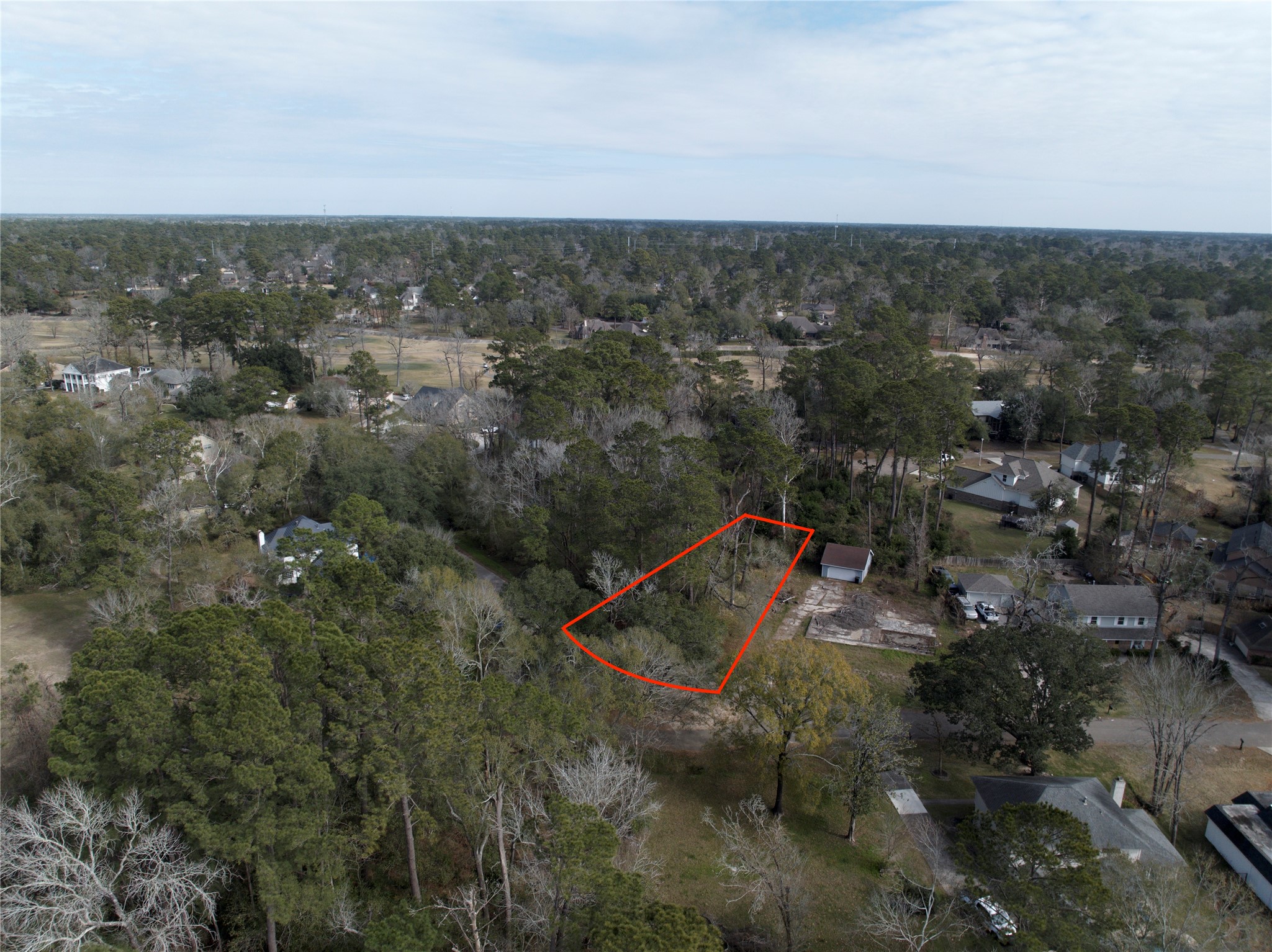 20 Brandon Road Conroe, TX 77302 - Photo 14 of 17 an aerial view of a house with a yard