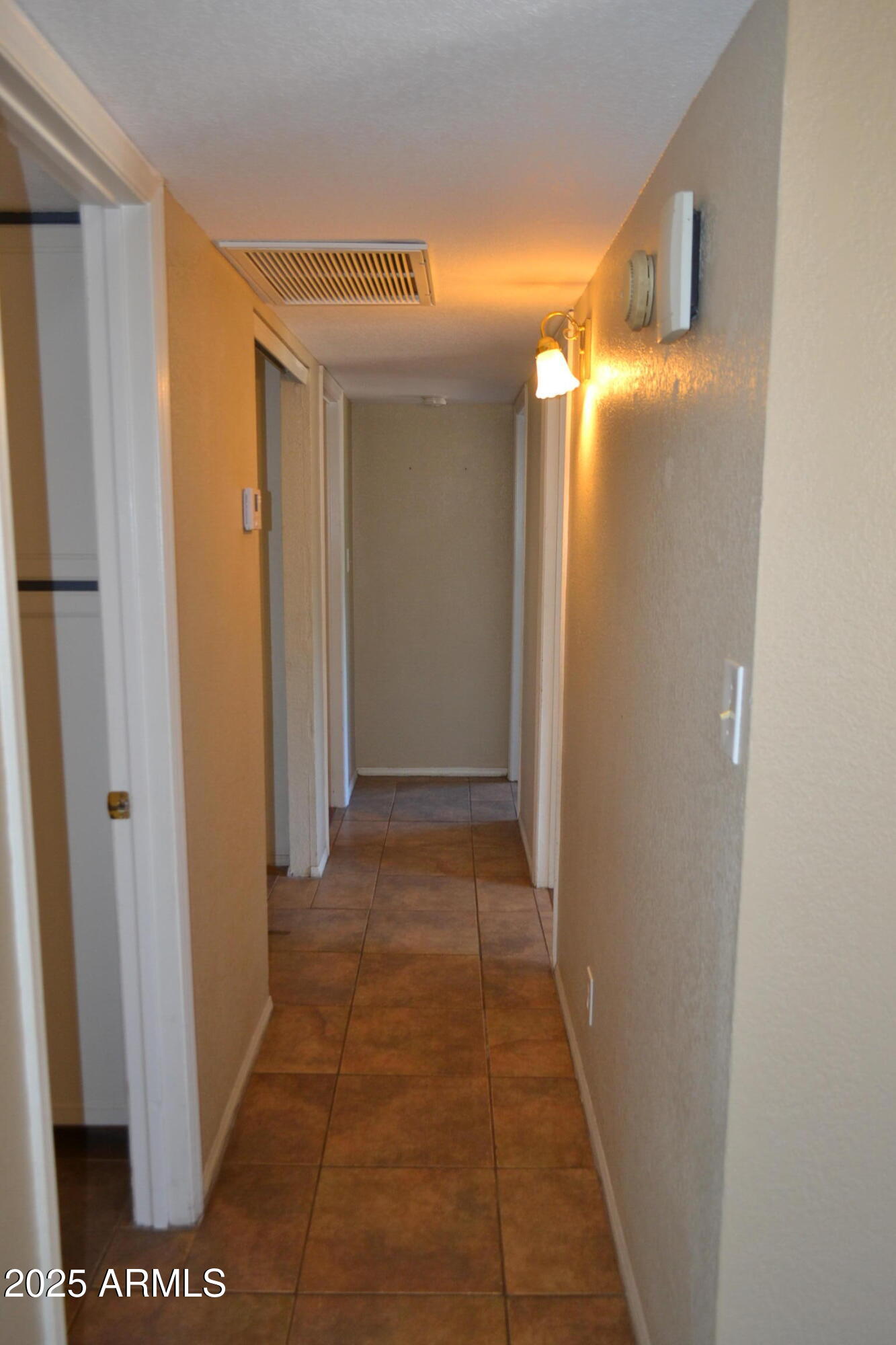 1162 South Ironwood Drive Apache Junction, AZ 85120 - Photo 6 of 14 a view of a big room with closet and door