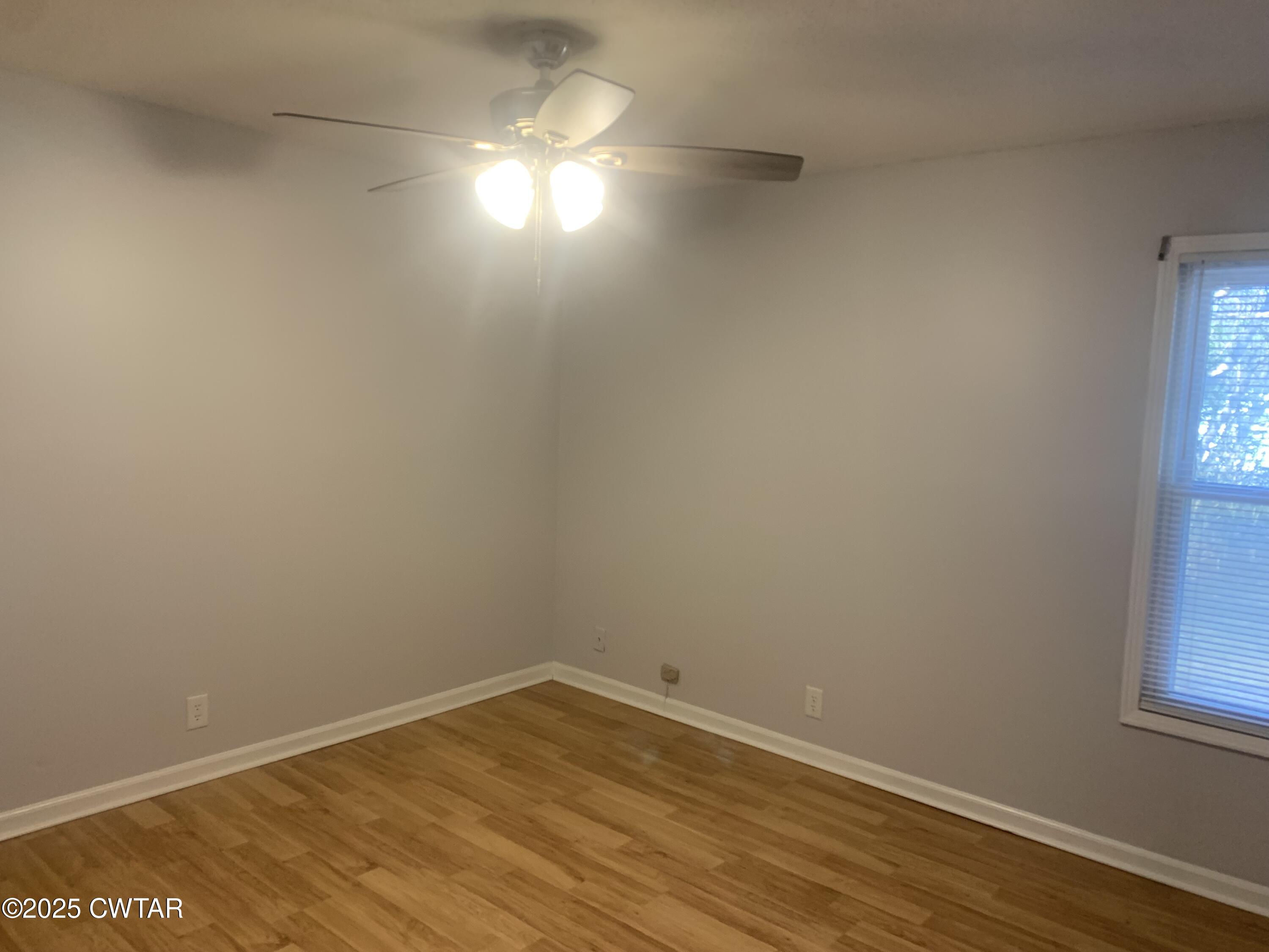 72 Laneview-Concord Road Trenton, TN 38382 - Photo 13 of 39 wooden floor in an empty room