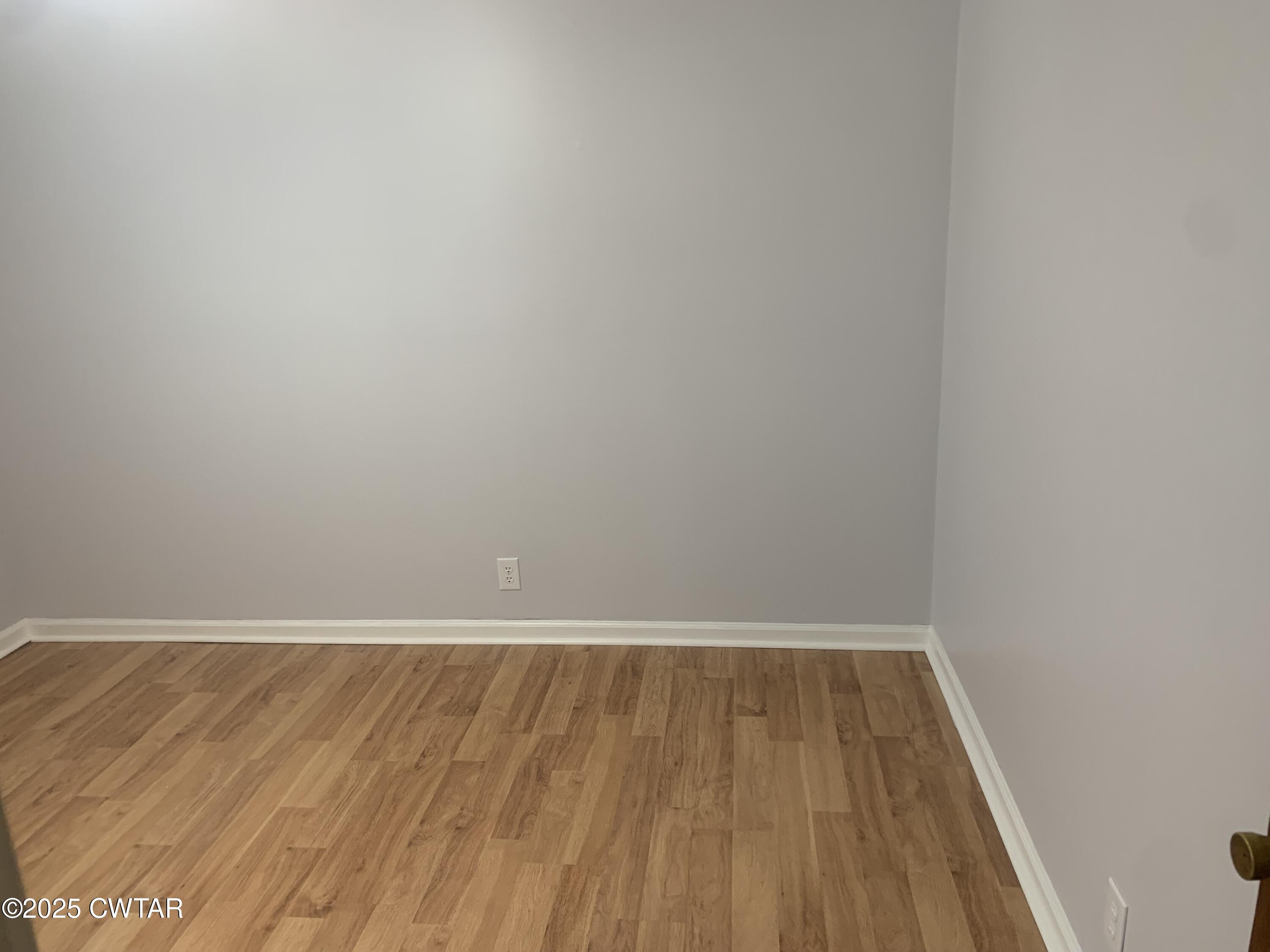 72 Laneview-Concord Road Trenton, TN 38382 - Photo 22 of 39 a view of wooden floor in a room