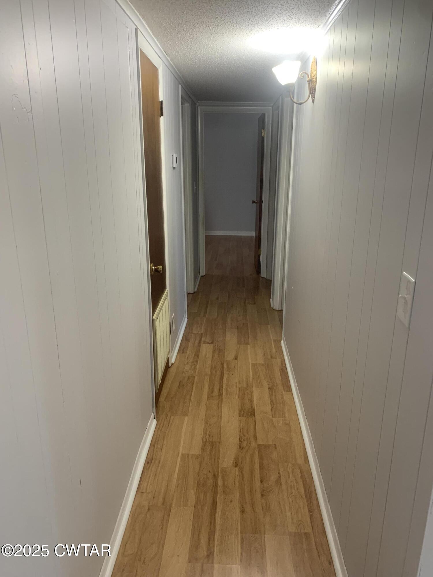 72 Laneview-Concord Road Trenton, TN 38382 - Photo 23 of 39 a view of gallery with wooden floor