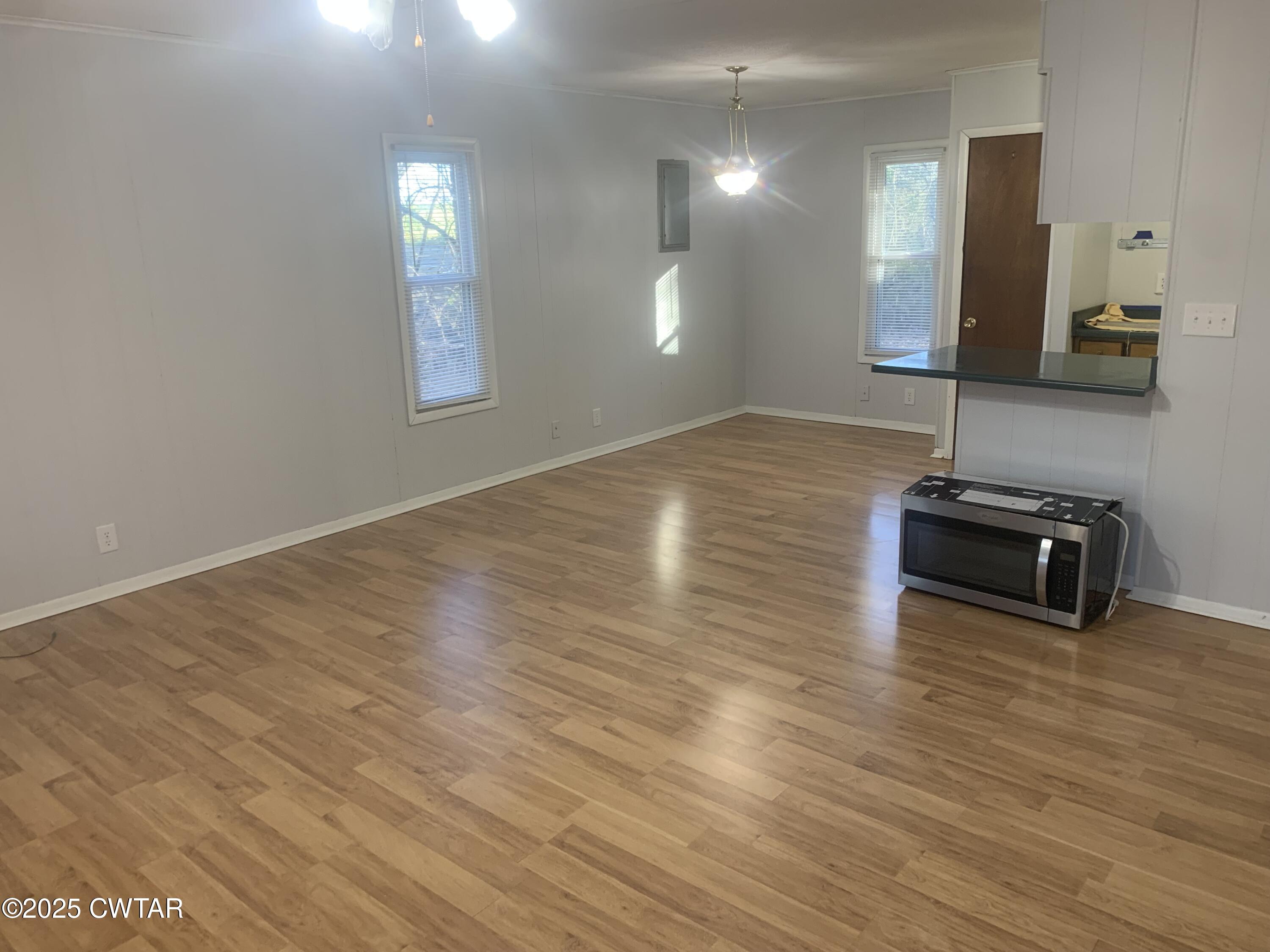 72 Laneview-Concord Road Trenton, TN 38382 - Photo 29 of 39 a view of a room with wooden floor