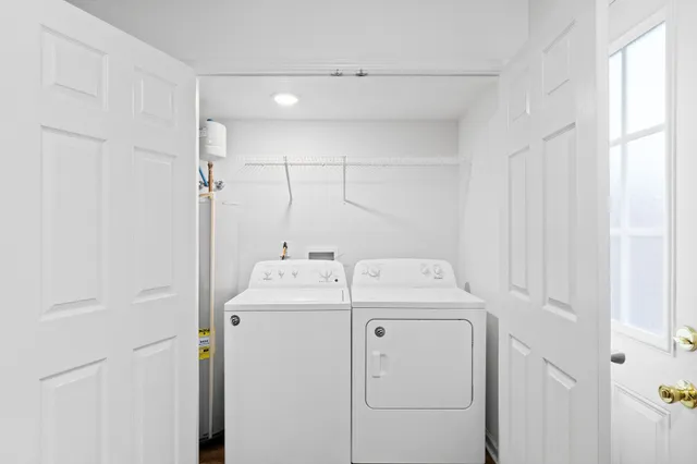 a utility room with dryer and washer