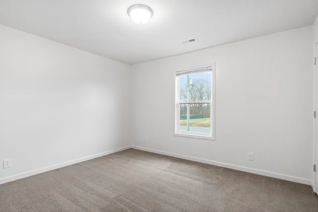 an empty room with a window