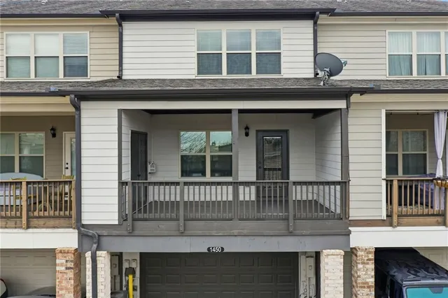 an aerial view of a house with outdoor space