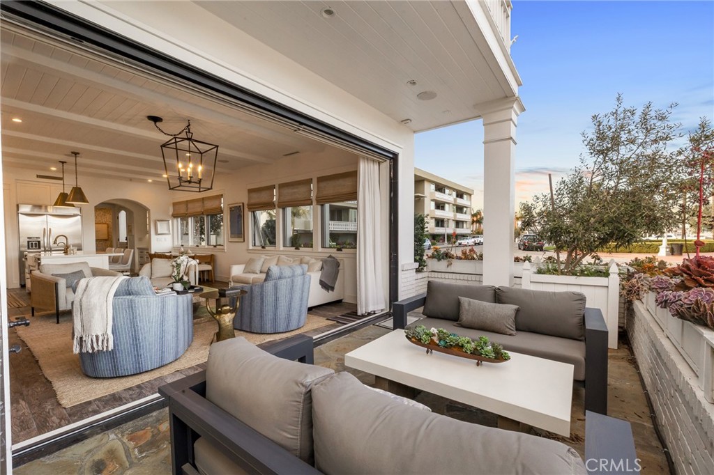 61 The Colonnade Long Beach, CA 90803 - Photo 12 of 49 a living room with furniture and a large window