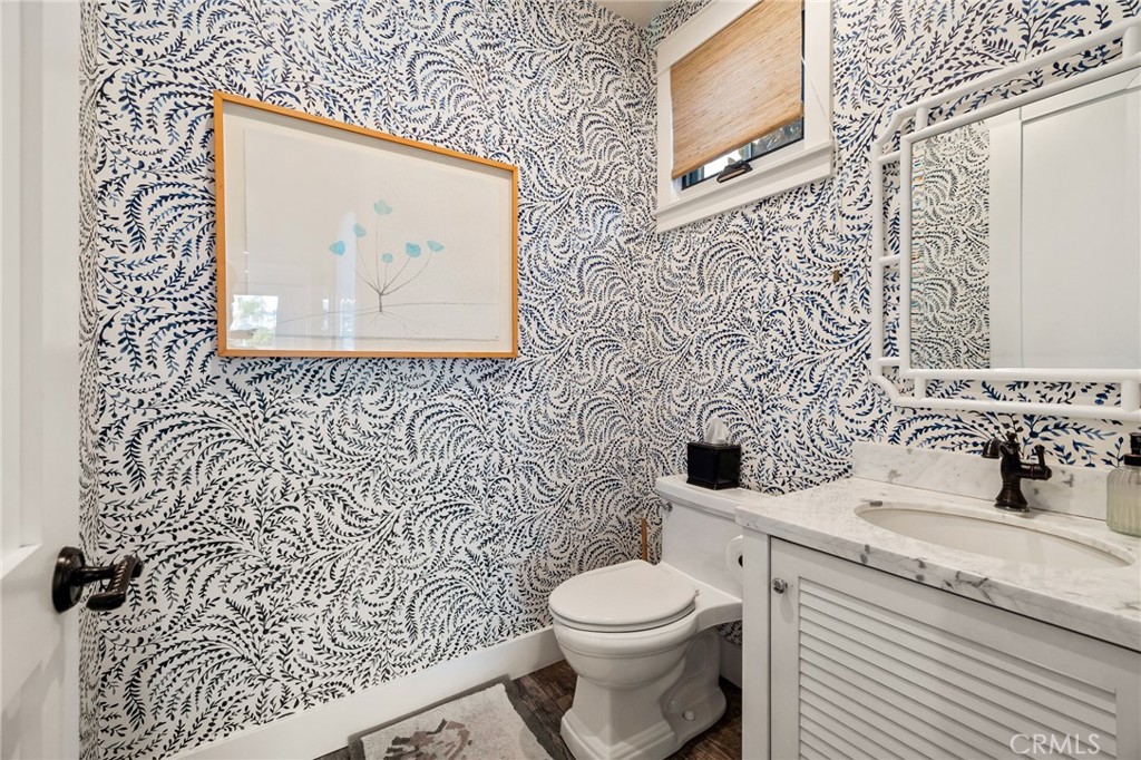 61 The Colonnade Long Beach, CA 90803 - Photo 19 of 49 a bathroom with a toilet and a sink