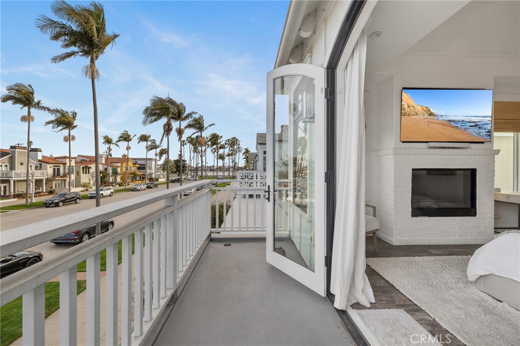 61 The Colonnade Long Beach, CA 90803 - Photo 25 of 49 a view of a kitchen with a sink and a fireplace