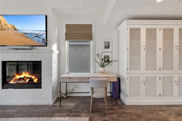 a spacious bathroom with a granite countertop double vanity sink a mirror and a shower