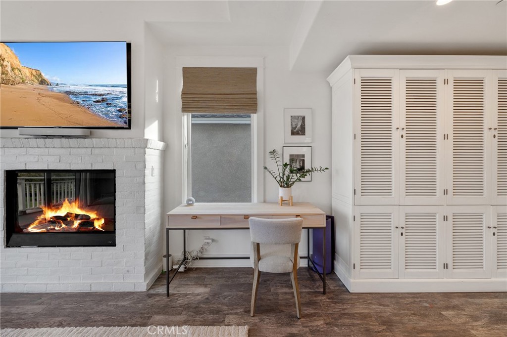 61 The Colonnade Long Beach, CA 90803 - Photo 27 of 49 a view of a livingroom with furniture and a fireplace