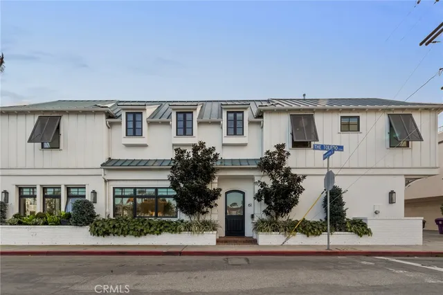 a view of a large building with a view of a house