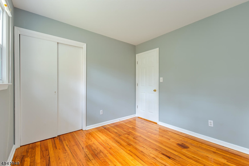 857 Cherry Hill Road Princeton, NJ 08540 - Photo 11 of 22 a view of empty room with wooden floor