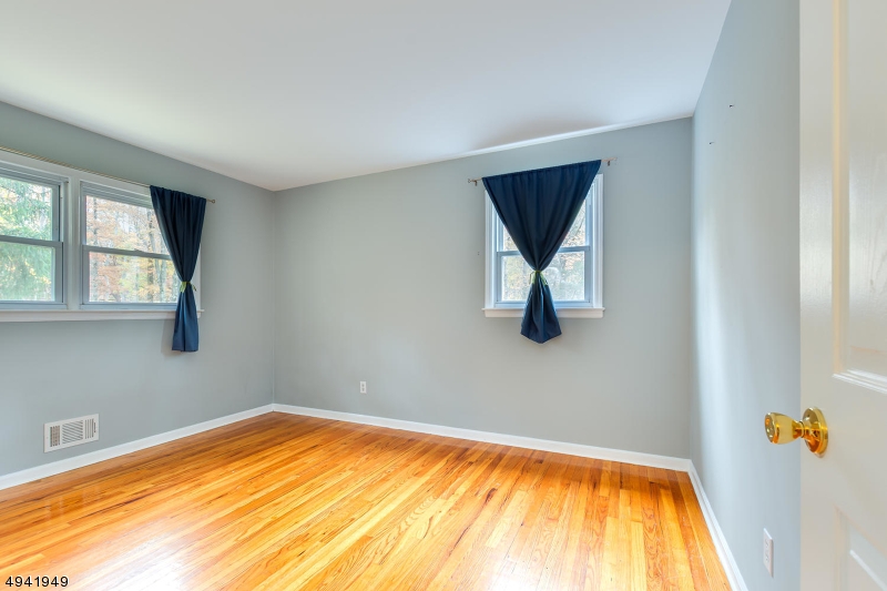 857 Cherry Hill Road Princeton, NJ 08540 - Photo 13 of 22 a bedroom with a bed and window
