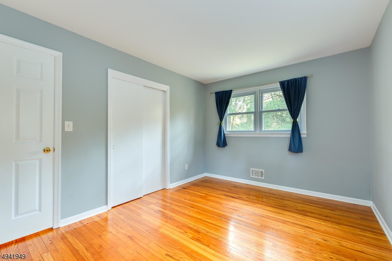 857 Cherry Hill Road Princeton, NJ 08540 - Photo 14 of 22 a bedroom with a bed and window