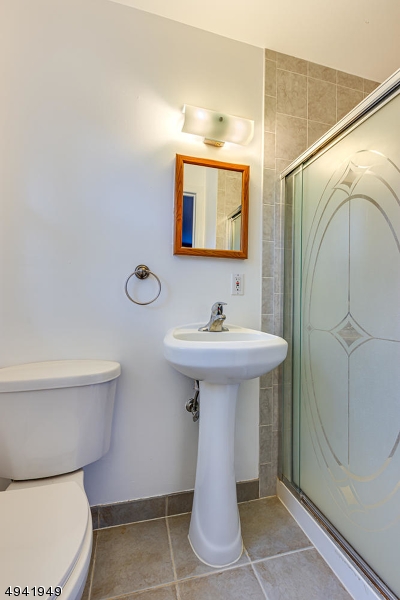 857 Cherry Hill Road Princeton, NJ 08540 - Photo 16 of 22 a bathroom with a sink toilet and shower