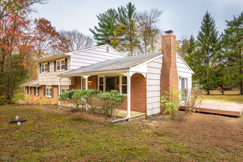857 Cherry Hill Road Princeton, NJ 08540 - Photo 20 of 22 a view of a house with a yard and sitting area
