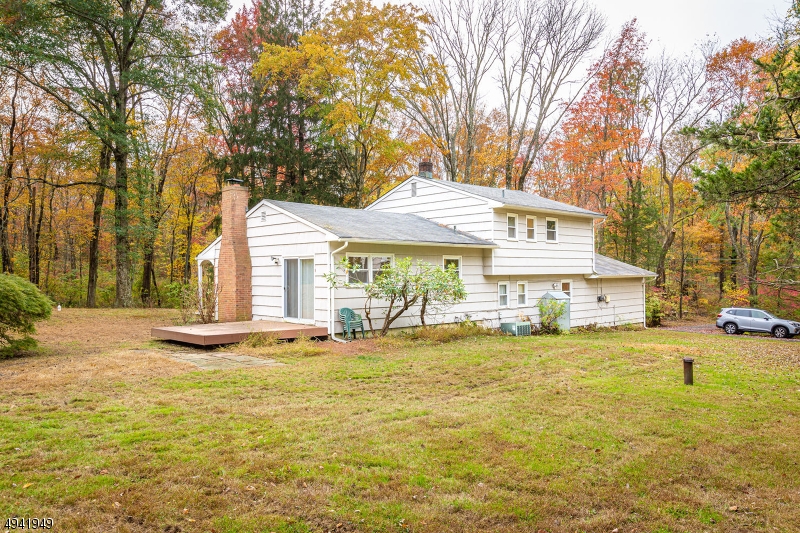 857 Cherry Hill Road Princeton, NJ 08540 - Photo 21 of 22 a front view of a house with swimming pool and porch with furniture