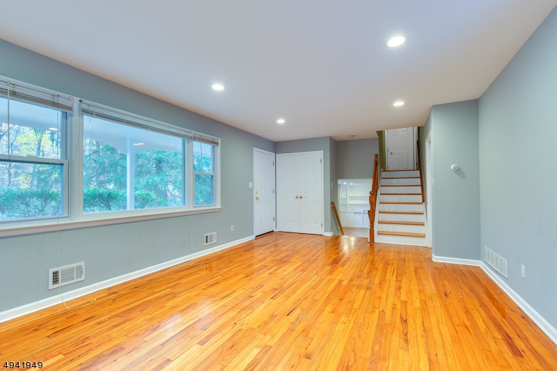 857 Cherry Hill Road Princeton, NJ 08540 - Photo 4 of 22 a view of a room with wooden floor and window