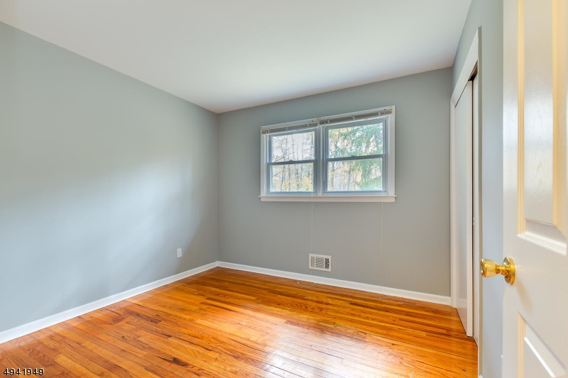 857 Cherry Hill Road Princeton, NJ 08540 - Photo 10 of 22 a view of empty room with wooden floor