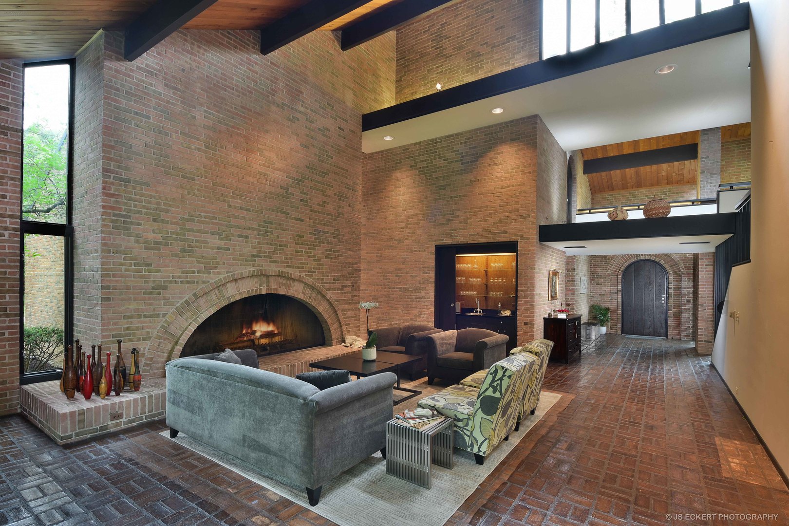 2345 Old Mill Road Lake Forest, IL 60045 - Photo 12 of 73 a living room with furniture and a fireplace