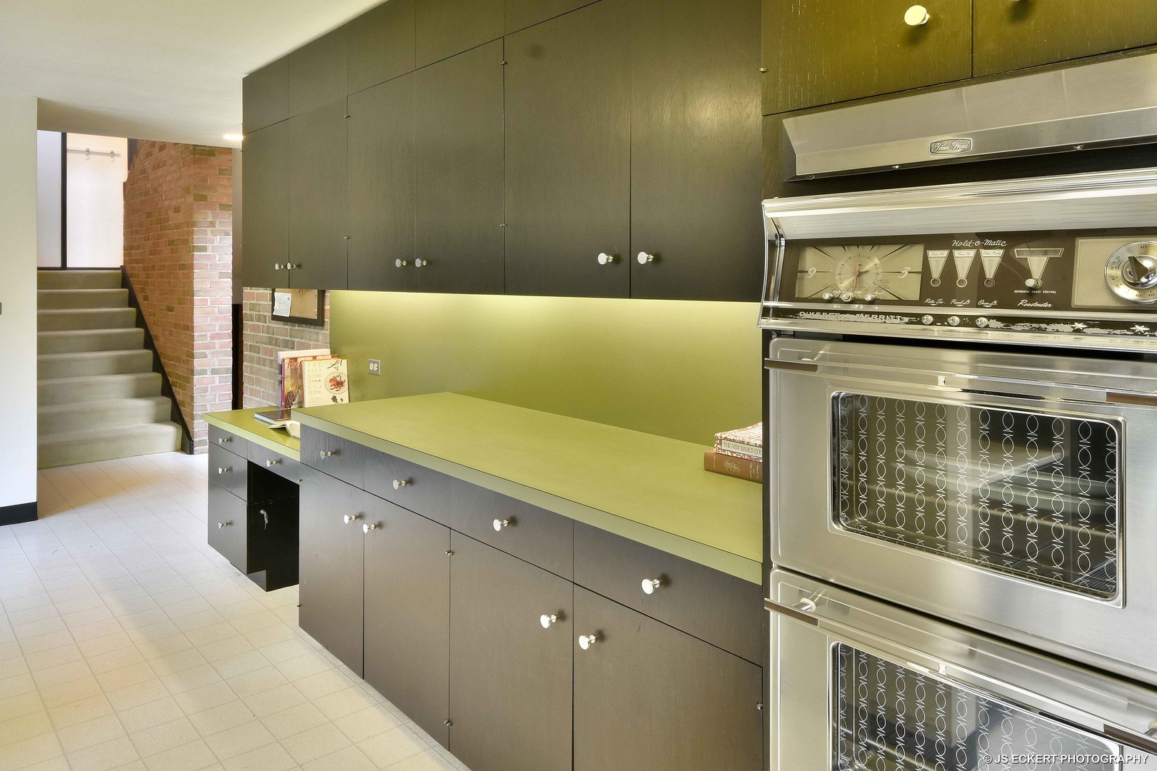 2345 Old Mill Road Lake Forest, IL 60045 - Photo 21 of 73 a kitchen with a sink and cabinets