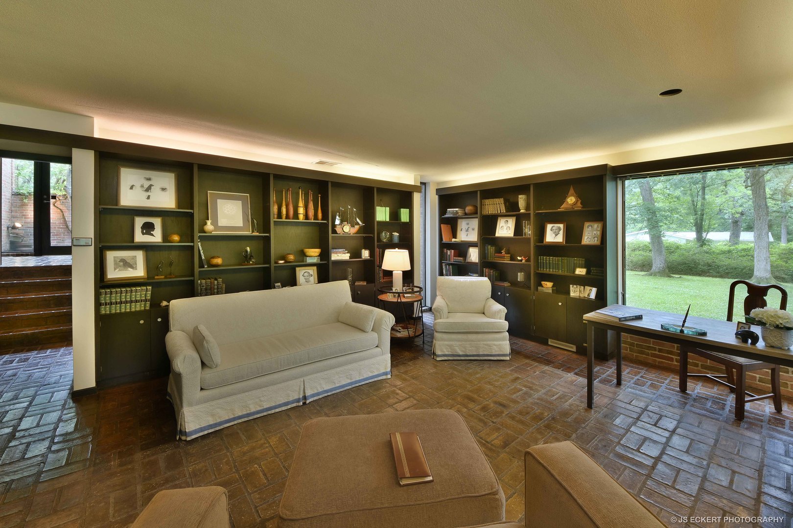 2345 Old Mill Road Lake Forest, IL 60045 - Photo 25 of 73 a living room with furniture and a floor to ceiling window