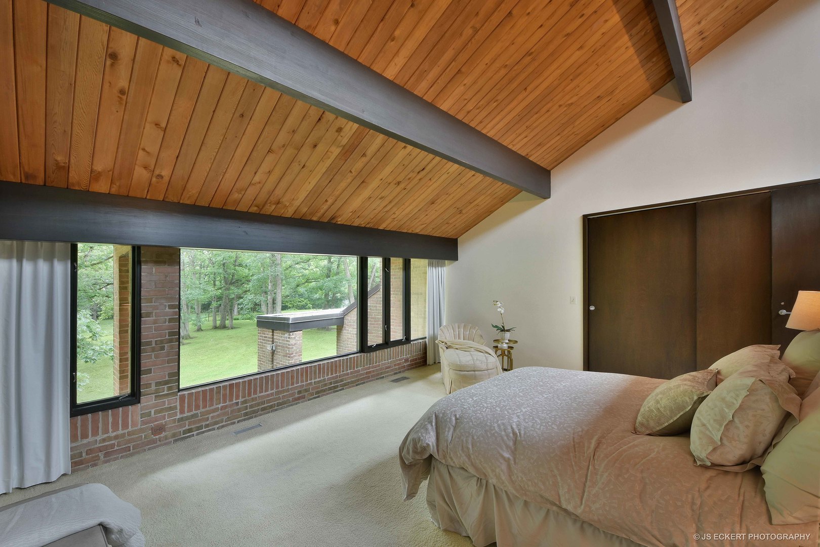 2345 Old Mill Road Lake Forest, IL 60045 - Photo 29 of 73 a bedroom with a bed and a large window