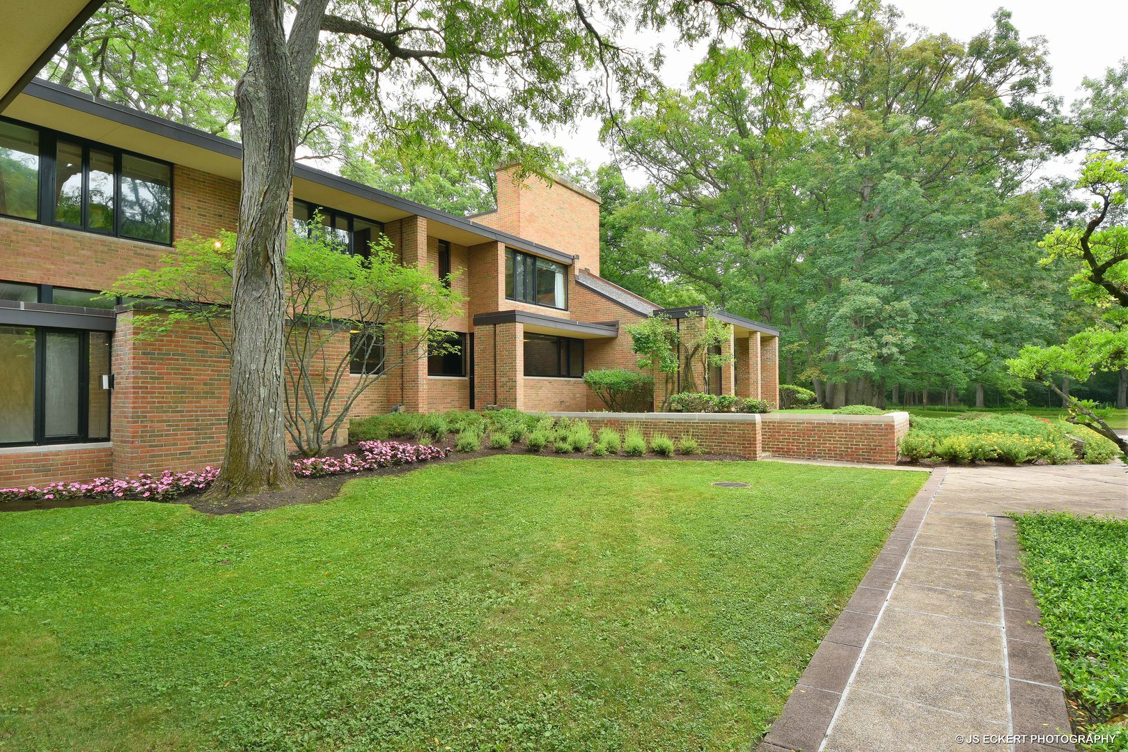 2345 Old Mill Road Lake Forest, IL 60045 - Photo 49 of 73 a front view of a house with garden