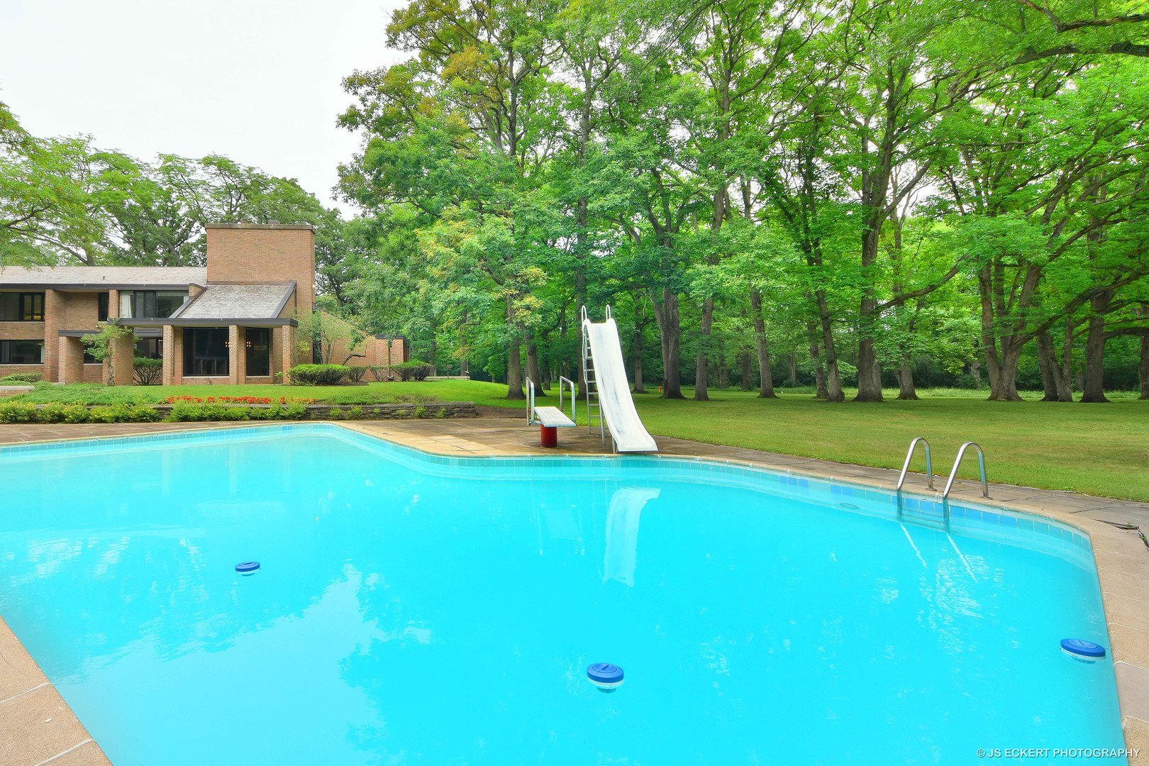 2345 Old Mill Road Lake Forest, IL 60045 - Photo 54 of 73 a view of a house with a swimming pool