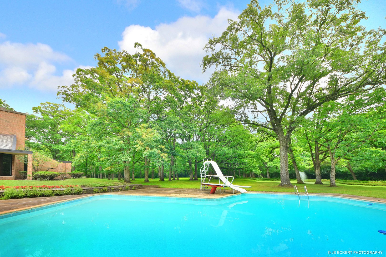 2345 Old Mill Road Lake Forest, IL 60045 - Photo 56 of 73 a view of a swimming pool with an outdoor space and seating area