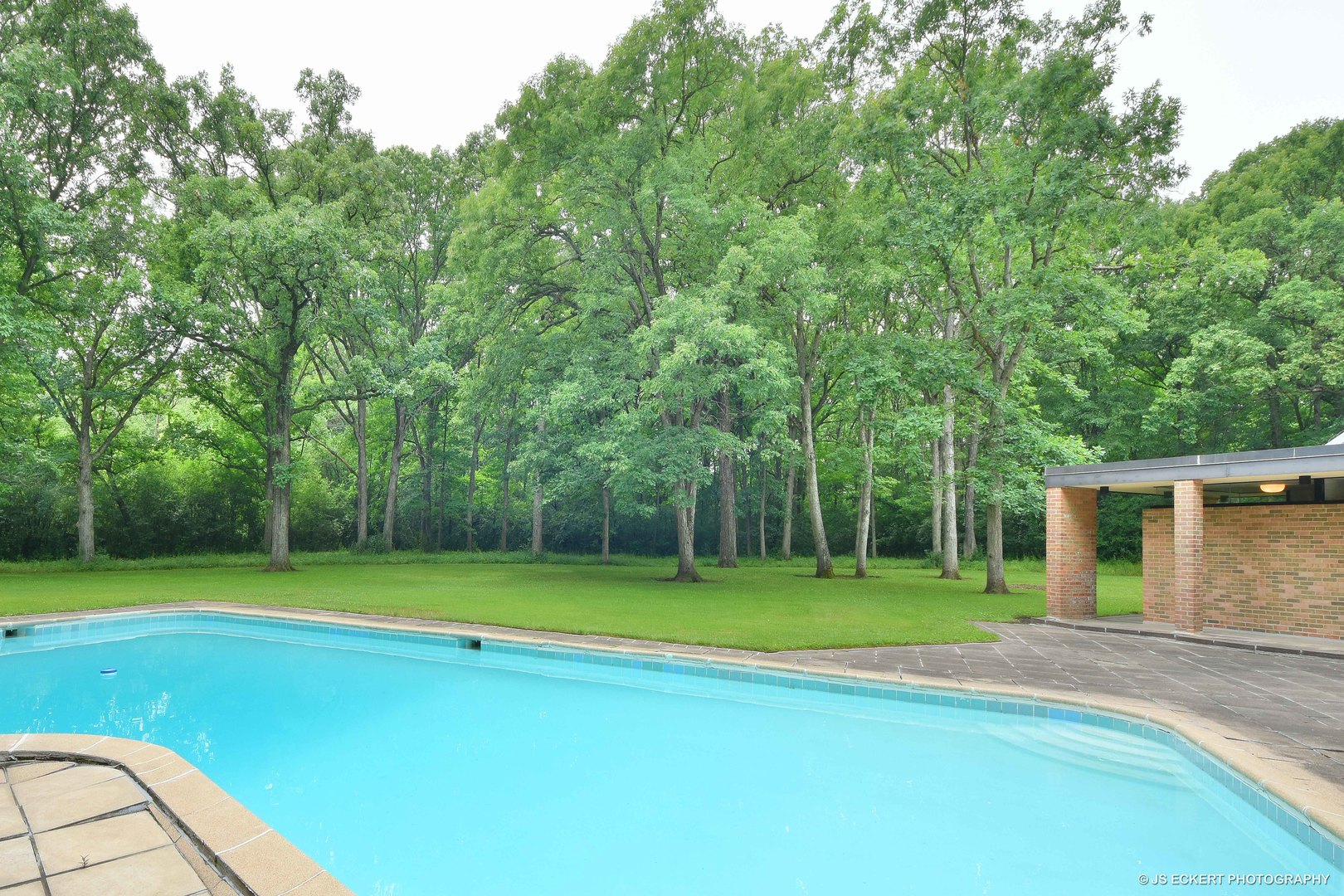 2345 Old Mill Road Lake Forest, IL 60045 - Photo 57 of 73 a view of a tennis ground with large trees