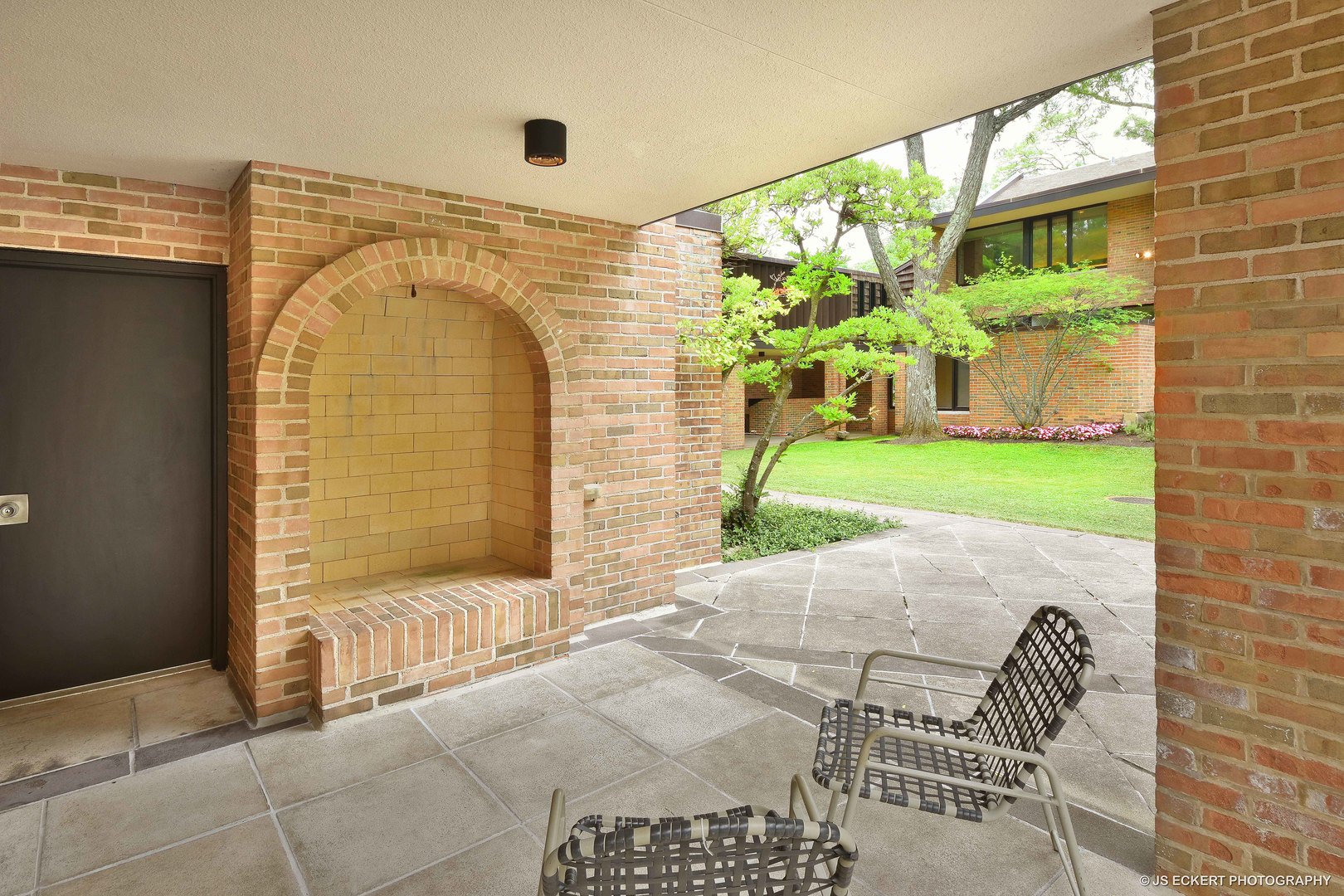 2345 Old Mill Road Lake Forest, IL 60045 - Photo 61 of 73 a front view of a house with a yard and garage
