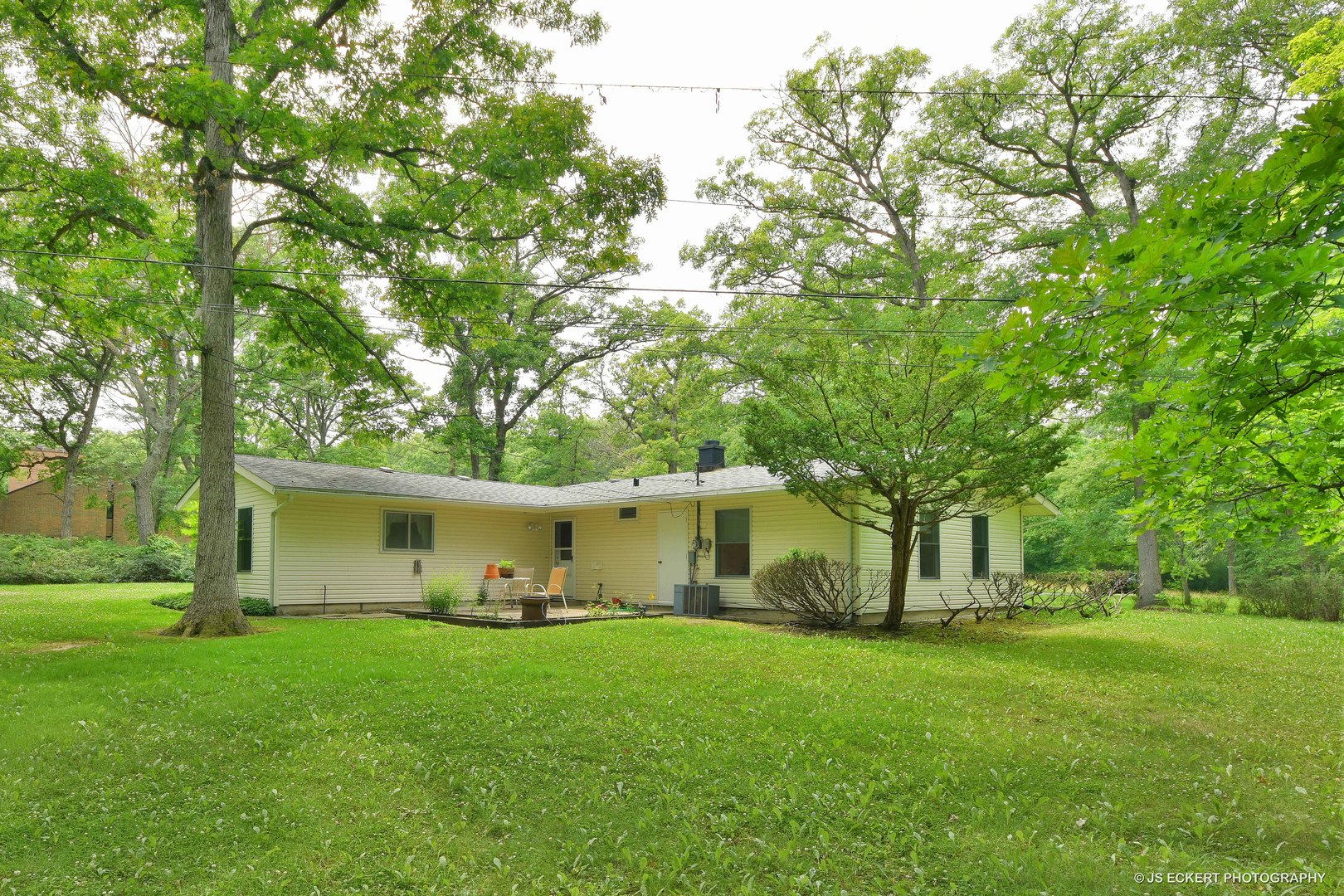 2345 Old Mill Road Lake Forest, IL 60045 - Photo 67 of 73 a view of a house with backyard and garden