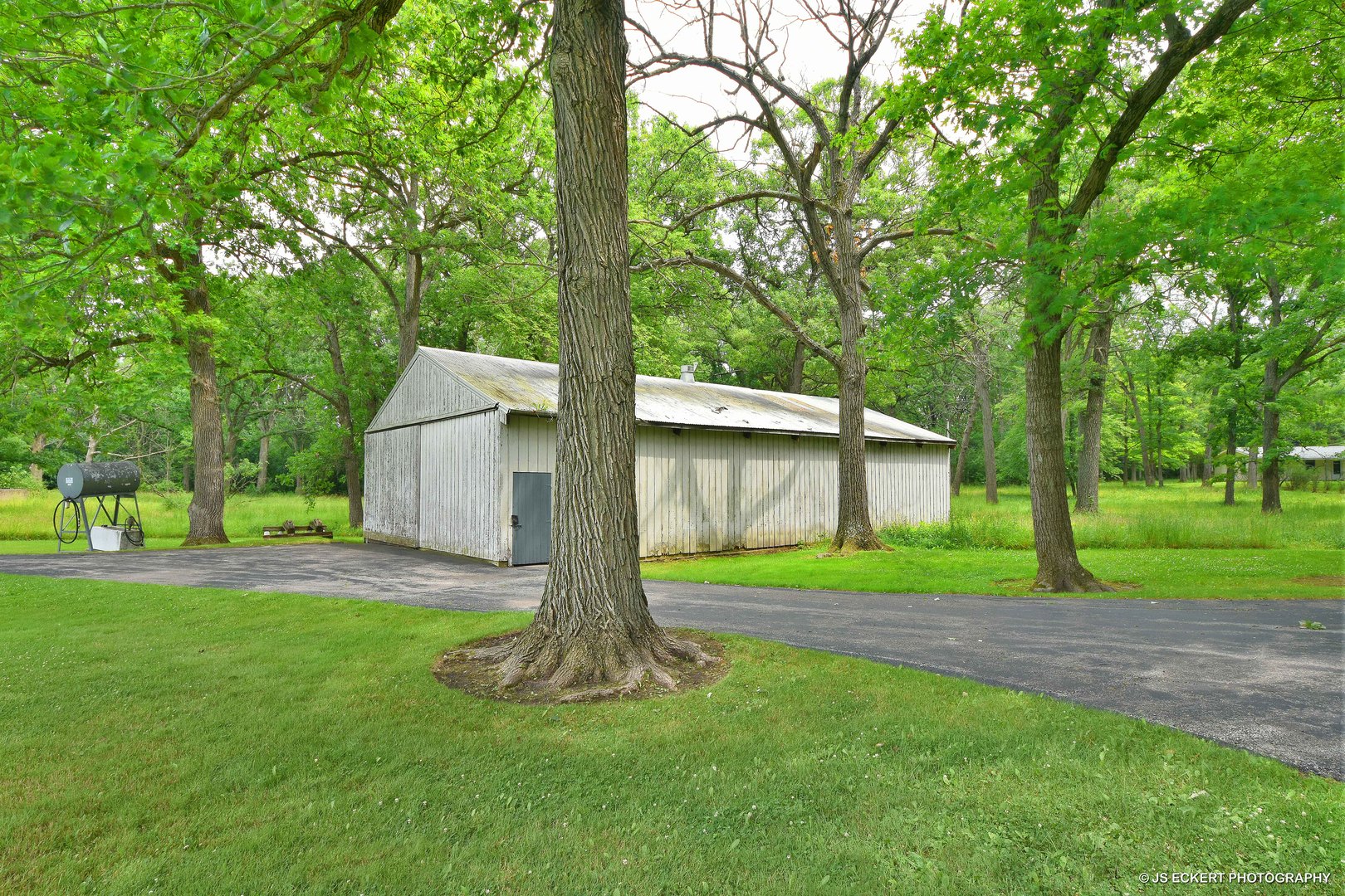 2345 Old Mill Road Lake Forest, IL 60045 - Photo 69 of 73 a front view of a house with a yard and tree
