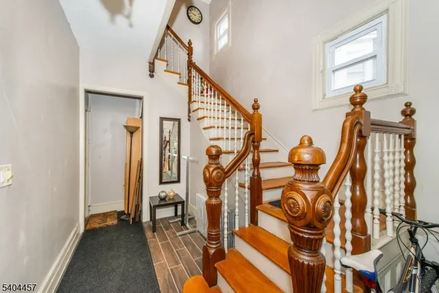 a view of entryway with wooden floor