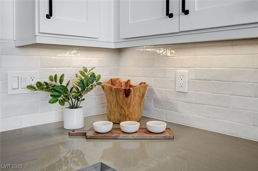 1995 Thunder Ridge Circle Henderson, NV 89012 - Photo 16 of 47 Interior details with white cabinets and tasteful backsplash