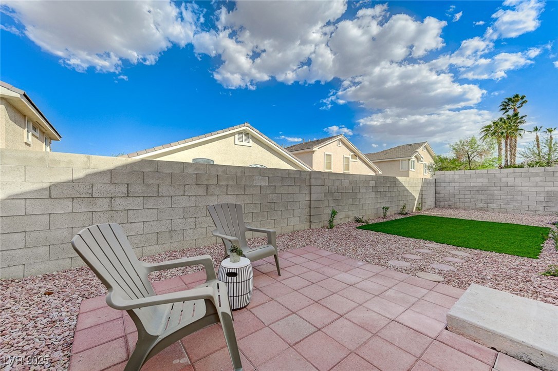 1995 Thunder Ridge Circle Henderson, NV 89012 - Photo 40 of 47 View of patio / terrace featuring a fenced backyard