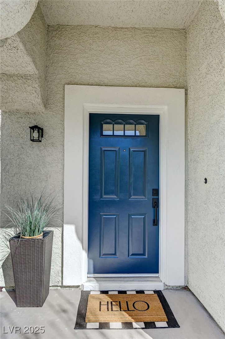 1995 Thunder Ridge Circle Henderson, NV 89012 - Photo 4 of 47 Property entrance featuring stucco siding
