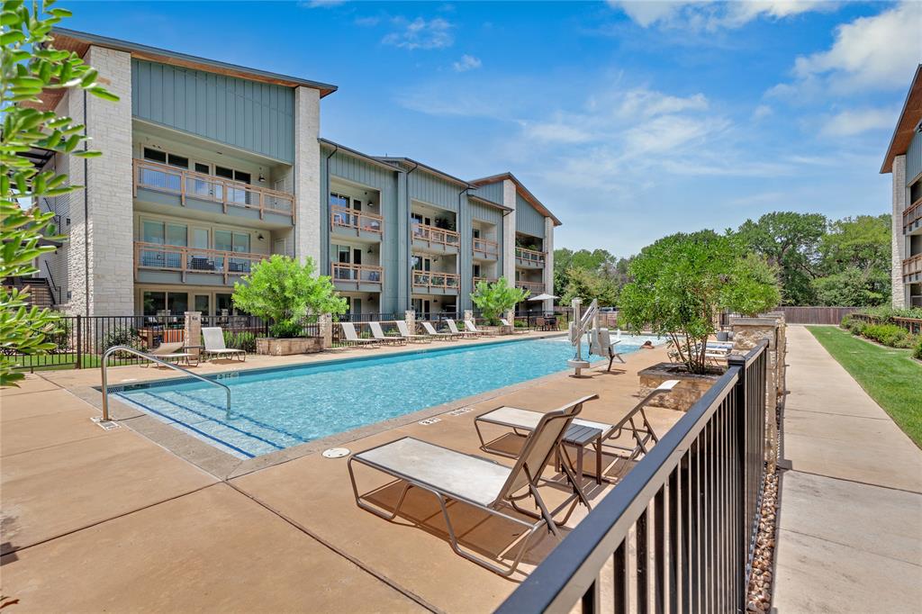 4704 Sunset Trail, Unit 1203 Austin, TX 78745 - Photo 20 of 26 Community pool featuring a patio area