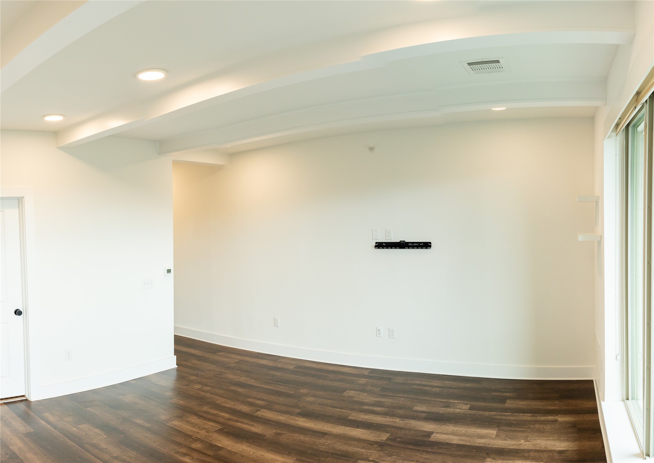 4704 Sunset Trail, Unit 1203 Austin, TX 78745 - Photo 5 of 26 Spare room with recessed lighting, dark wood finished floors, and beam ceiling