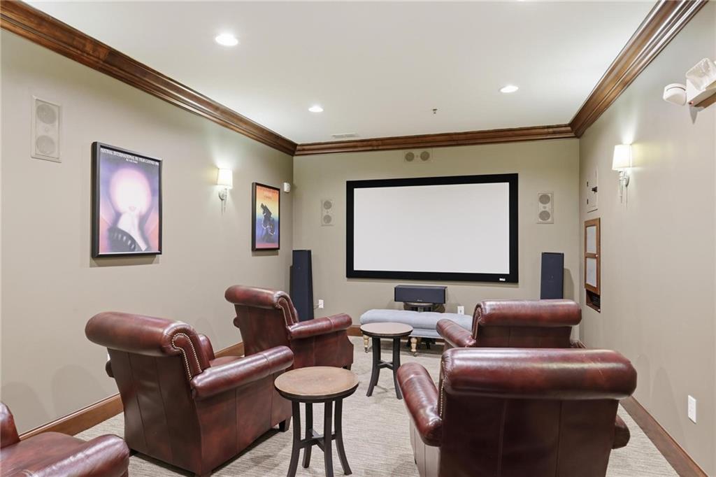 901 Abernathy Road Northeast, Unit 3080 Atlanta, GA 30328 - Photo 21 of 21 a projector room with furniture